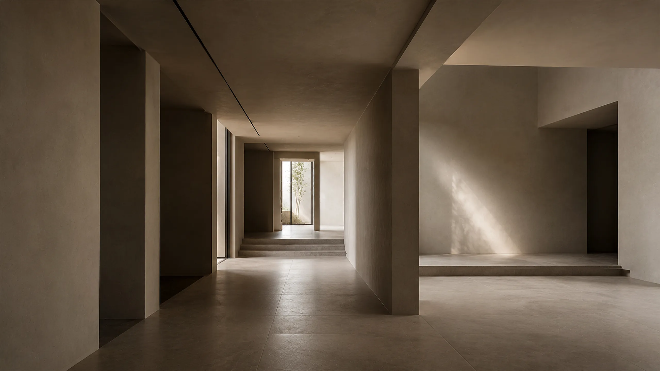 Warm minimalist interior with layered thresholds, open circulation, spatial depth and controlled natural light, illustrating interior design as organization rather than decoration.