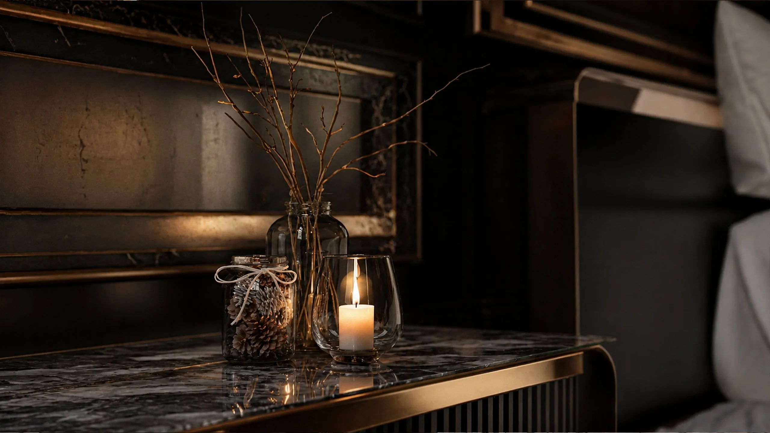Bedroom detail with black marble and a candle in the Jumeirah Private Residence, Dubai, by Nariman Fatemi.